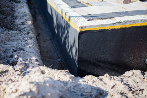 Professional Exterior Waterproofing technician working in Lynchburg, VA